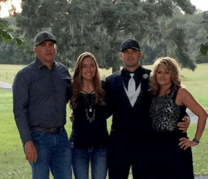 Custom home builders E.D. “Tripp” and Kristie Norfleet, pictured with their two wonderful children, Zeke and Christianna